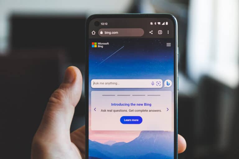 A person showcasing the Windows 10 app with Microsoft's Bing AI Chatbot and delving into its code.
